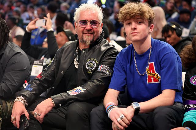 <p>Tim Nwachukwu/Getty</p> Guy Fieri and his son Ryder