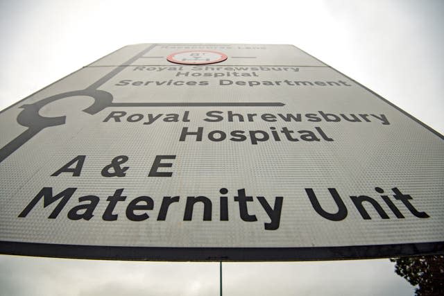 Road sign directing drivers to a maternity unit