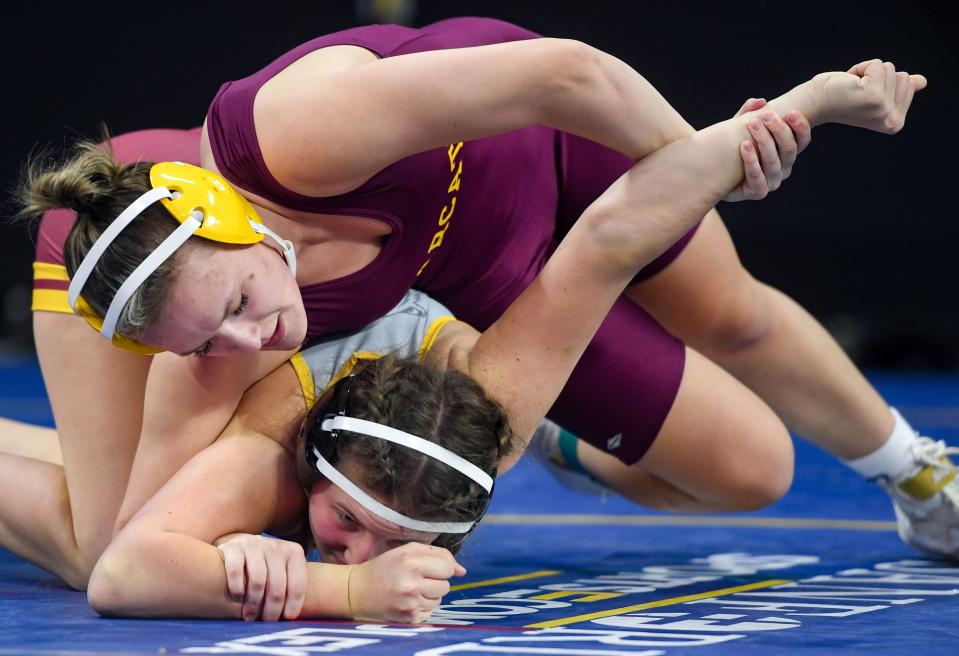 Webster Area's Annie Witt holds the arm of Harrisburg's Rhiannen Heimdal in the quarterfinals at the State Wrestling Tournament on Thursday, February 24, 2022, at the Denny Sanford Premier Center in Sioux Falls.