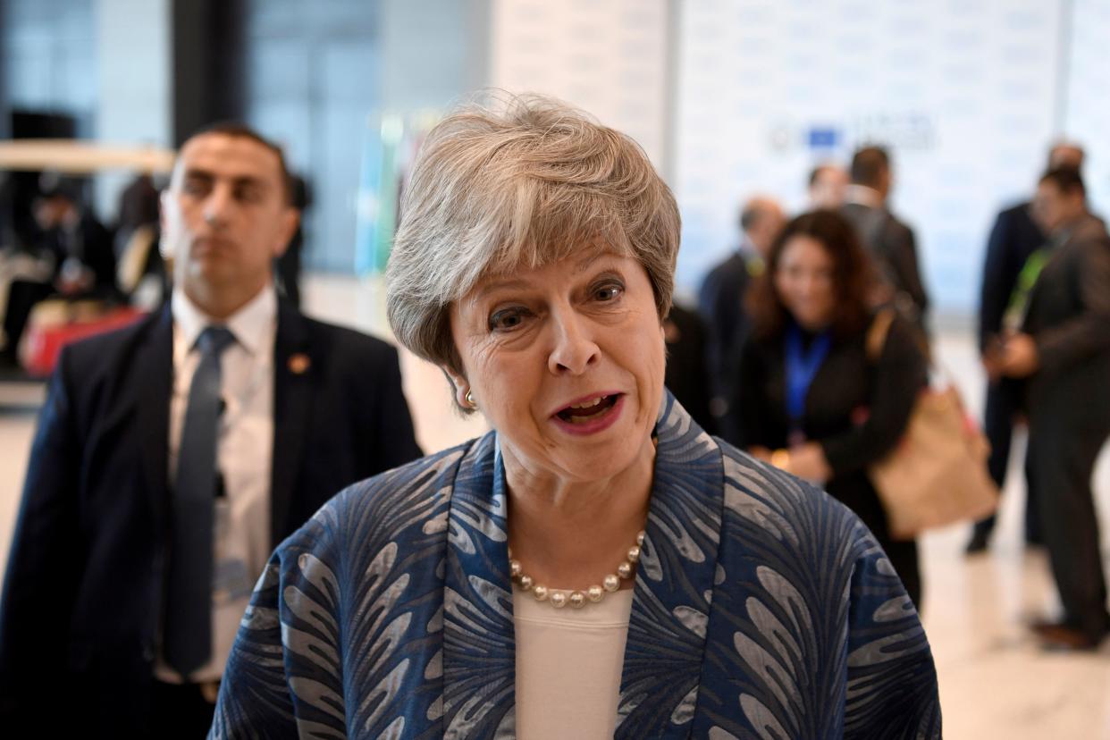 Theresa May speaks to the press during the first joint European Union and Arab League summit in Sharm el-Sheikh (Getty Images)