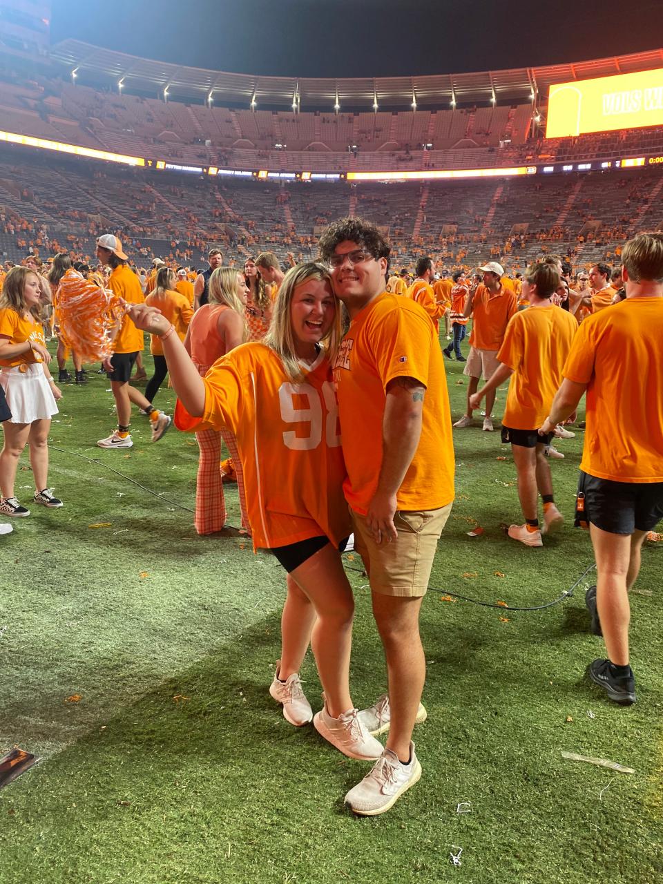 Nate Jones and Abbey Wallace share in the fun of a Tennessee football victory.