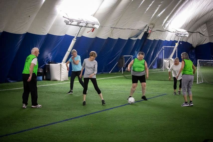 A file photo of a group of seniors participating in a walking soccer program at the North Shore Indoor Facility in North Vancouver, B.C. in May 2023.  (Ben Nelms/CBC - image credit)