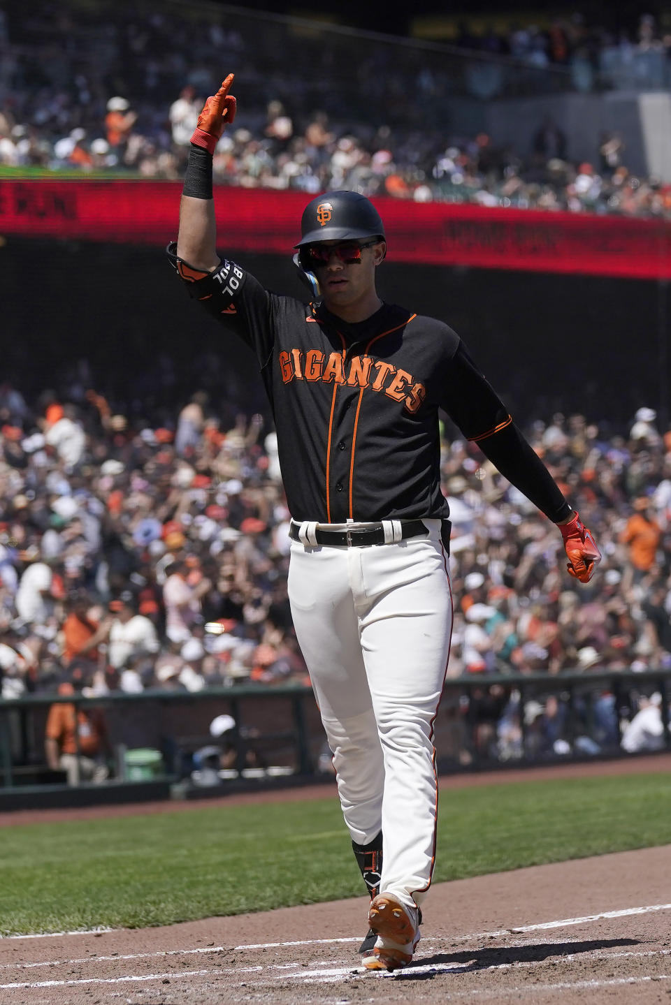 San Francisco Giants' Blake Sabol gestures after hitting a two-run home run against the Baltimore Orioles during the sixth inning of a baseball game in San Francisco, Sunday, June 4, 2023. (AP Photo/Jeff Chiu)