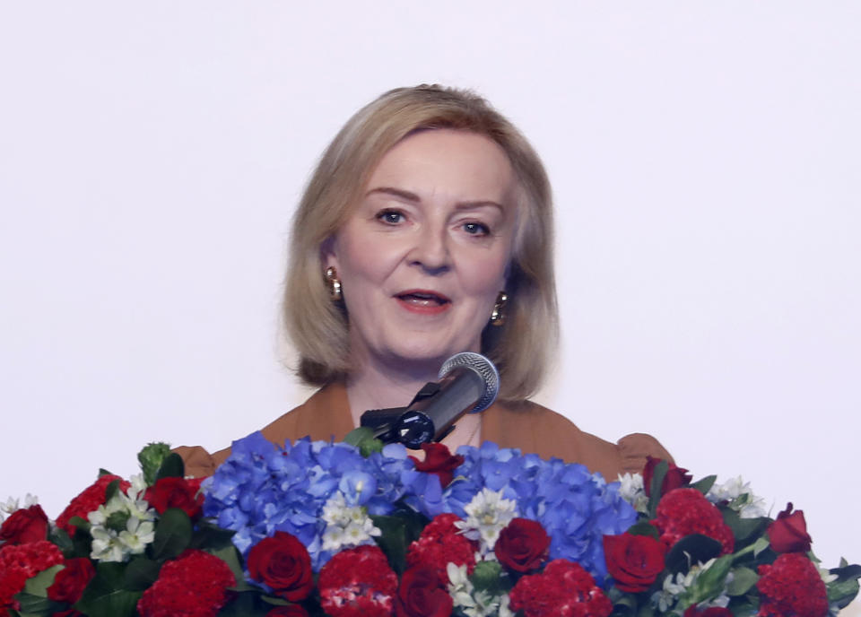 Former Britain's Prime Minister Liz Truss delivers a speech on the second day of her five-day visit in Taipei, Taiwan, Wednesday, May 17, 2023. (AP Photo/ Chiang Ying-ying)