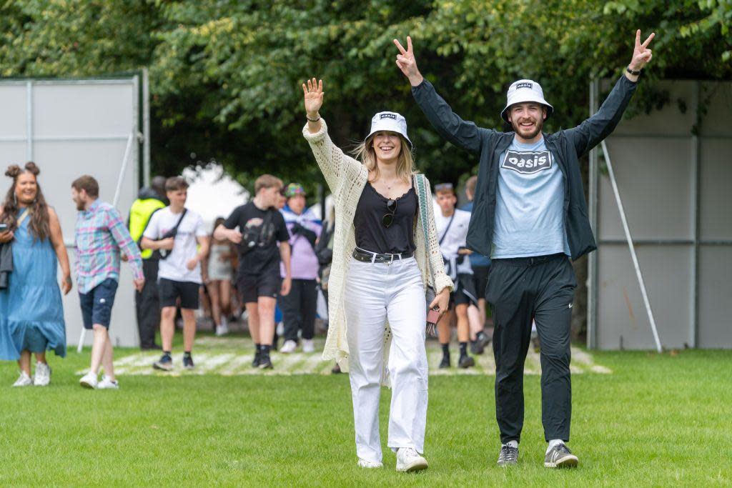 Man and woman arrive at Glasgow Green for TRNSMT festival