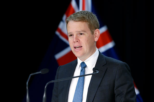 Health Minister Chris Hipkins speaks to media during a press conference at Parliament in Wellington, New Zealand. 