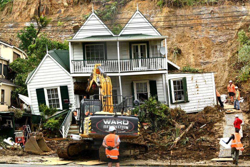 A property in Remuera where an a man was found dead after a landslide hit his house is seen on 29 January in Auckland (Getty Images)