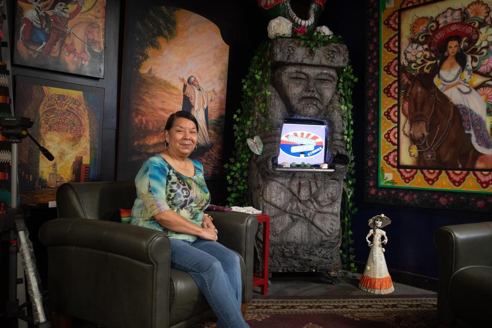 Irma Payán sits on the set of her self-titled show for Arizona Barrio Stories. Payàn has interviewed numerous community members with compelling stories to share about Arizona's history.