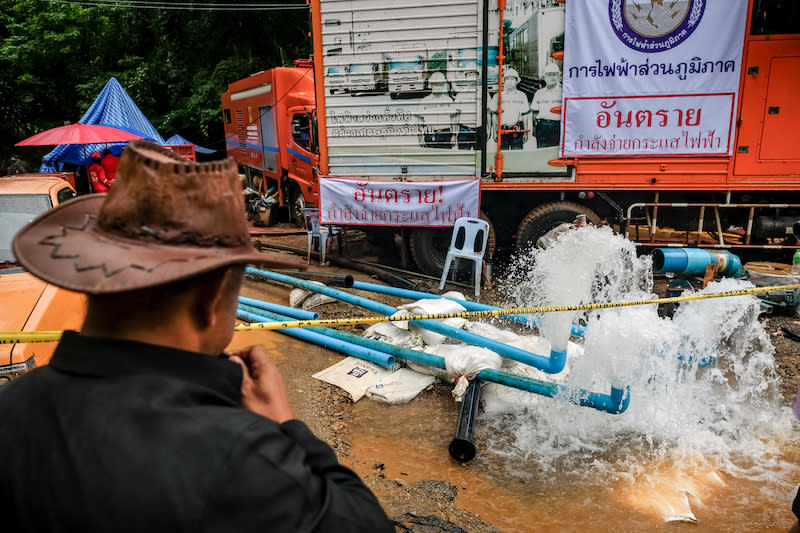 <p>Water pumping machines run during an ongoing mossion to rescue 12 boys and their soccer coach from a cave in Thailand. They disappeared for over a week after monsoon rains blocked the main entrance on July 03, 2018 in Chiang Rai. Chiang Rai governor Narongsak Osatanakorn announced on Monday that the boys, aged 11 to 16, and their 25-year-old coach were being rescued from Tham Luang Nang Non cave after they were discovered by naval special forces and the challenge now will be to extract the party safely. (Photo from Linh Pham/Getty Images) </p>