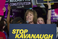 <p>Sen. Tina Smith, D-Minn., speaks in front of the Supreme Court in Washington, Monday, July 9, 2018, after President Donald Trump announced Judge Brett Kavanaugh as his Supreme Court nominee. (Photo: Cliff Owen/AP) </p>