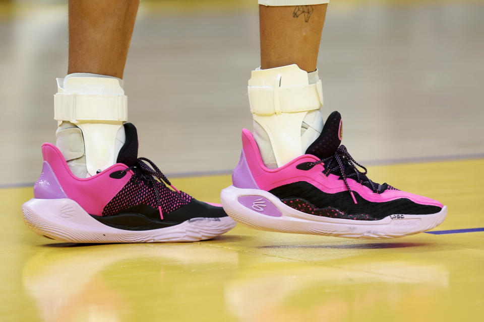 Steph Curry wearing Under Armour Curry 11 GD sneakers on the court