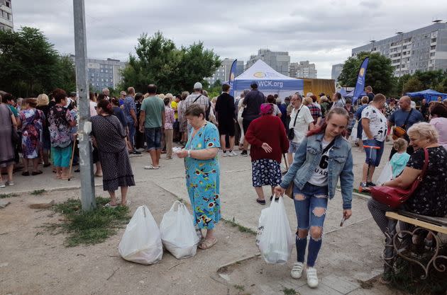 People receiving humanitarian aid in June in Zaporizhzhya, Ukraine, near the largest nuclear plant in Europe. (Photo: SOPA Images via Getty Images)