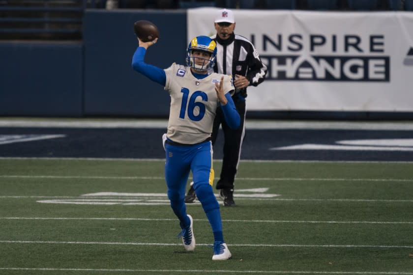 Rams quarterback Jared Goff passes during the second half of an NFL wild-card playoff game at Seattle on Jan. 9, 2021.