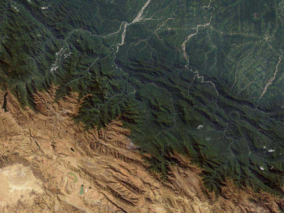 In the northeast of this satellite image of the Bolivian Andes, herringbone patterns show areas of deforestation (NASA/Jesse Allen/University of Maryland)