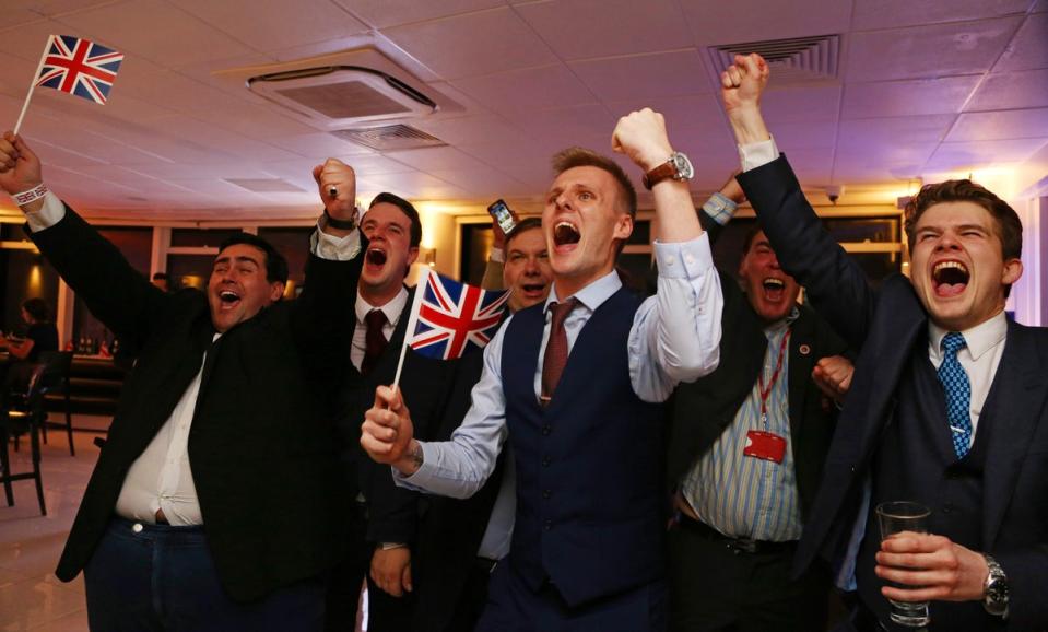 Supports of Brexit cheer as the result of the EU referendum in 2016 comes in - but the British public say it was a bad move for the economy (AFP via Getty Images)