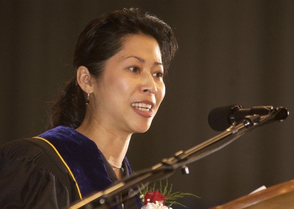 Loung Ung speaks to the St. Michael's College class of 2003 during  its commencement ceremony. Ung is a 1993 graduate of the Colchester school.