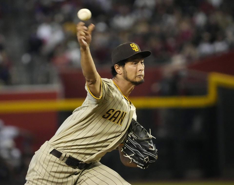 San Diego Padres starting pitcher Yu Darvish (11) throws against the Arizona Diamondbacks during the first inning at Chase Field on April 23, 2023.