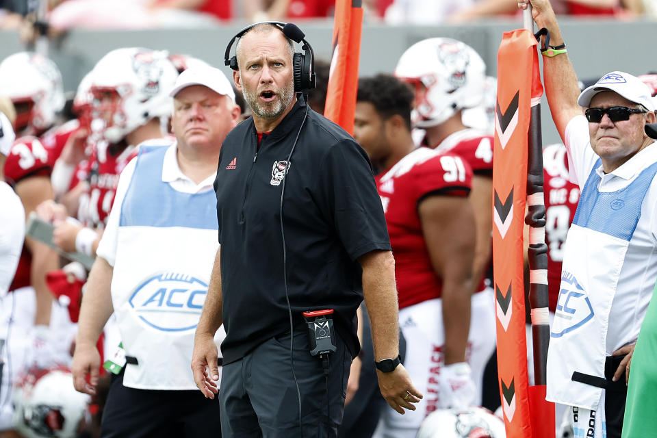 North Carolina State head coach Dave Doeren watches a replay during the second half of an NCAA college football game against the Charleston Southern in Raleigh, N.C., Saturday, Sept. 10, 2022. (AP Photo/Karl B DeBlaker)