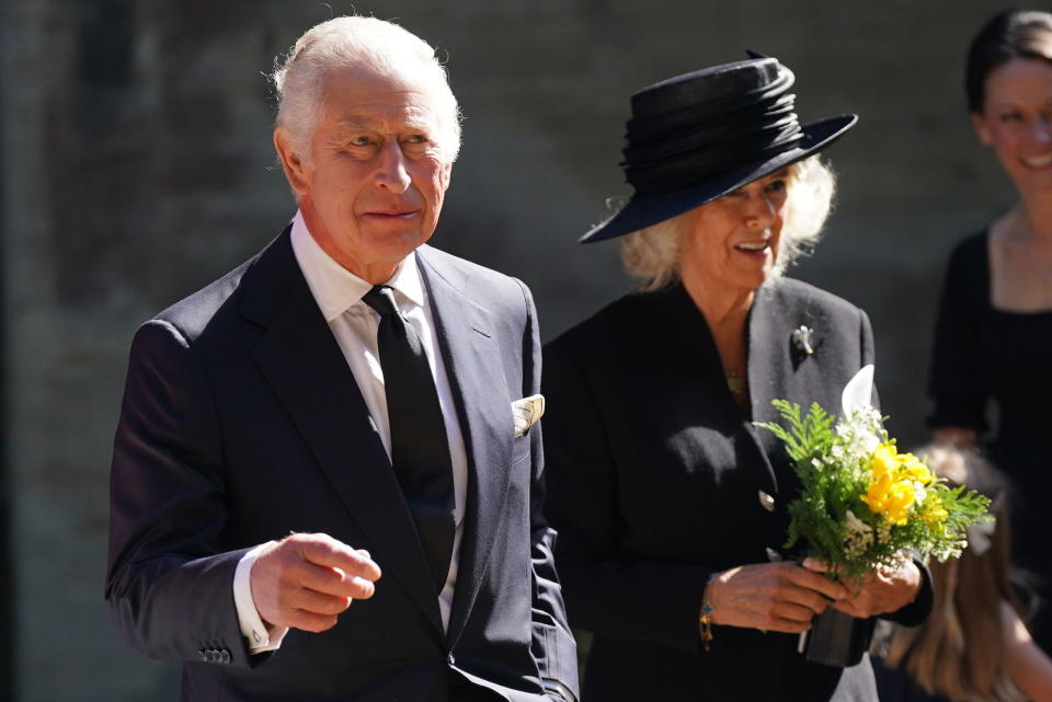 Britain's King Charles III and Camilla, the Queen Consort leave following a Service of Prayer and Reflection for the life of Queen Elizabeth II, at Llandaff Cathedral in Cardiff, Wales, Friday Sept. 16, 2022. King Charles III and Camilla, the Queen Consort, have arrived in Wales for an official visit. The royal couple previously visited to Scotland and Northern Ireland, the other nations making up the United Kingdom, following the death of Queen Elizabeth II at age 96 on Thursday, Sept. 8. (Jacob King/PA via AP)