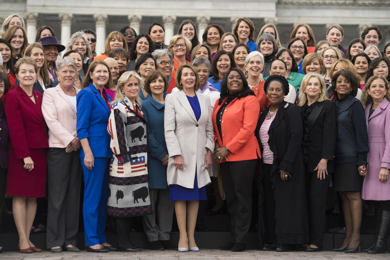 Speaker Nancy Pelosi, D-Calif., center, poses with Democratic women members of the House after a group photo on the East Front of the Capitol on January 4, 2019. (Photo: Tom Williams/CQ Roll Call)