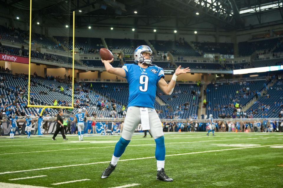 Detroit Lions quarterback Matthew Stafford warms up before the game on Thanksgiving against the Philadelphia Eagles at Ford Field, Nov. 26, 2015.