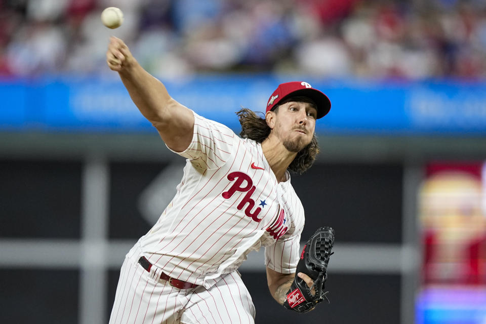 FILE - Philadelphia Phillies starting pitcher Michael Lorenzen throws against the Arizona Diamondbacks during the fifth inning in Game 6 of the baseball NL Championship Series in Philadelphia Monday, Oct. 23, 2023. Lorenzen signed a one-year contract and joined the Texas Rangers on Friday, March 22, 2024, giving the World Series champions another starting pitcher less than a week before the season opener. (AP Photo/Brynn Anderson, File)