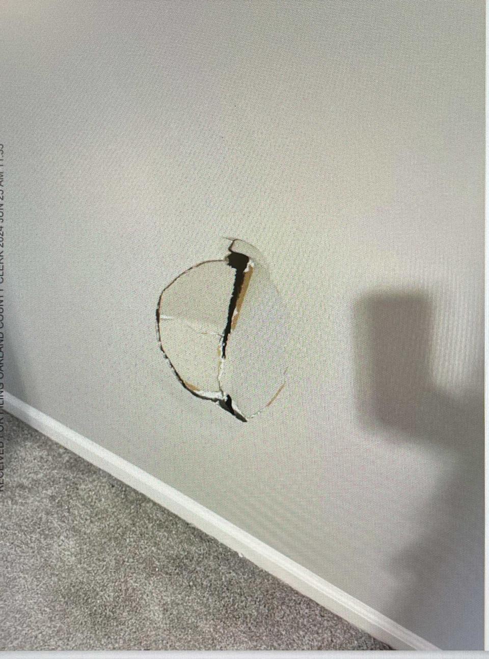 Former Wayne County CFO Tony Saunders' wife included this photo with her application for a personal protection order against Saunders. She wrote that he threatened to kill her and threw her head into a wall, creating this hole during a June 23, 2024 fight in her home.