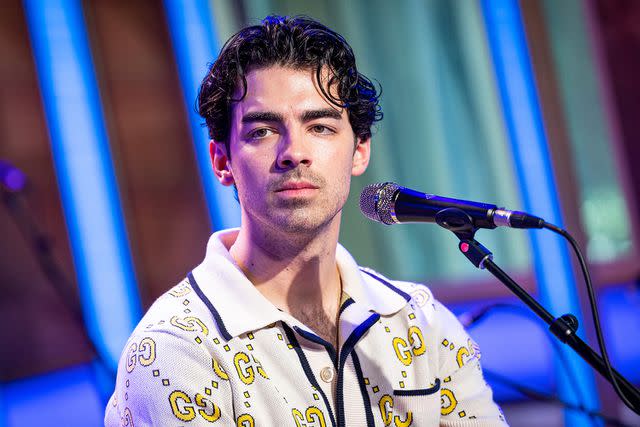 <p>Emma McIntyre/Getty Images</p> Joe Jonas on stage during SiriusXM Hits 1 Celebrity Session in May 2023