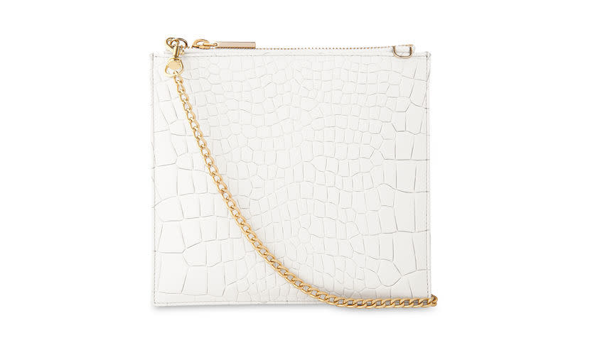 <p><i><a href="http://www.whistles.com/women/accessories/small-accessories/tumbled-croc-perry-clutch-22524.html?dwvar_tumbled-croc-perry-clutch-22524_color=White#gclid=CLfpubGv98sCFWQq0wodOPwN0g&start=1" rel="nofollow noopener" target="_blank" data-ylk="slk:[Whistles, £75];elm:context_link;itc:0;sec:content-canvas" class="link ">[Whistles, £75]</a></i><br></p>