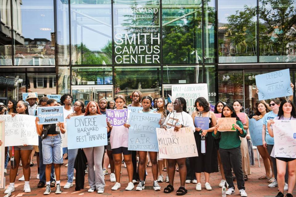 Participants rally protesting the Supreme Court's ruling against affirmative action.