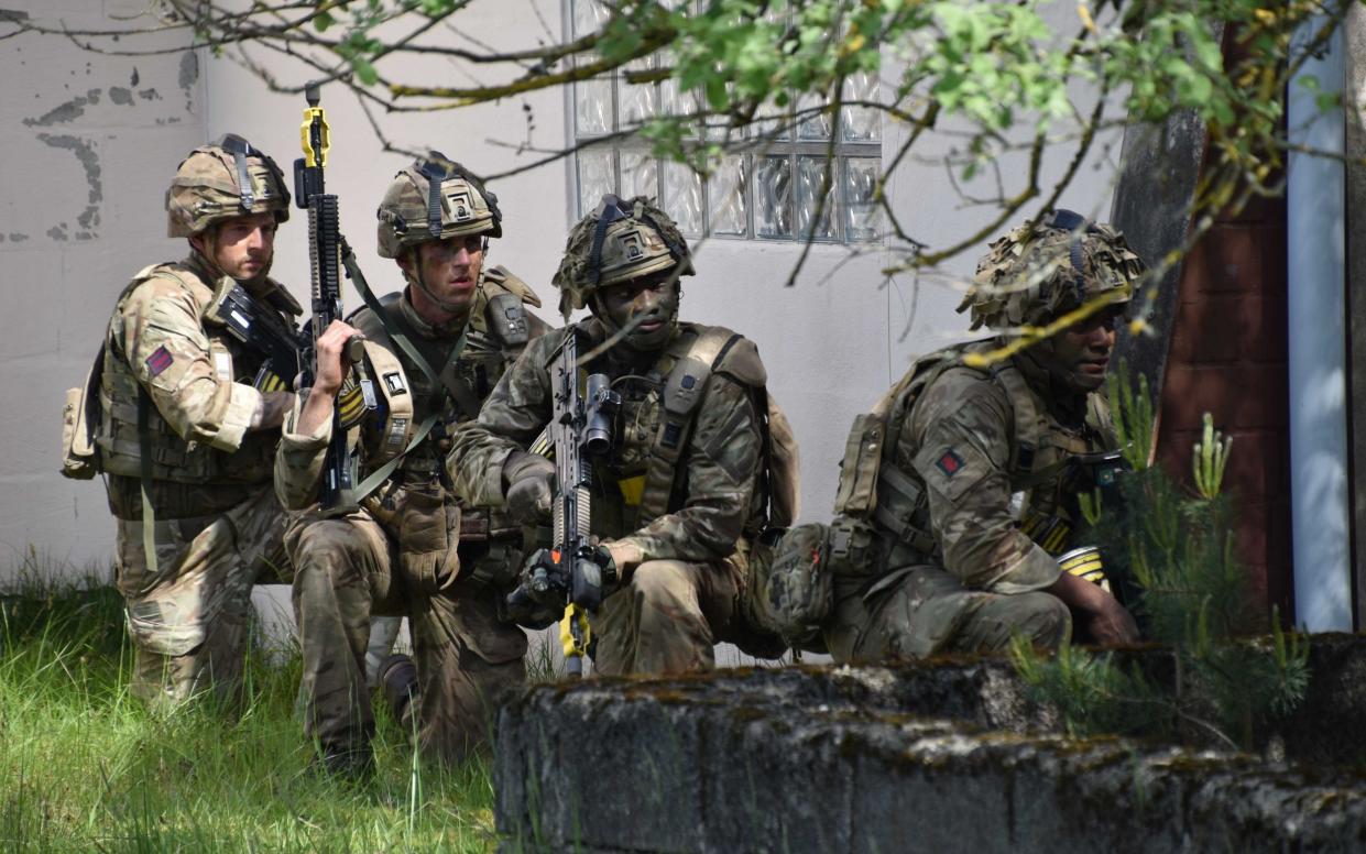 Soldiers from the Royal Tank Regiment prepare for a deployment to Estonia