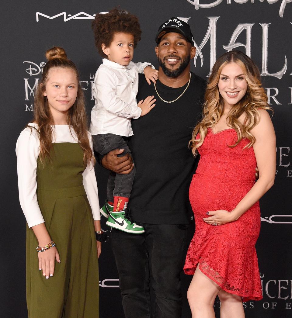 Stephen Boss and Allison Holker arrive at the World Premiere Of Disney's "Maleficent: Mistress Of Evil" at El Capitan Theatre on September 30, 2019 in Los Angeles, California.