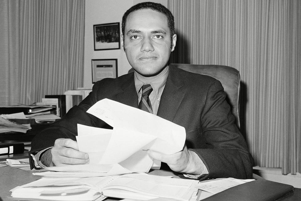 Clifford L Alexander Jr. poses in his Washington office after resigning as chairman of the Equal Employment Opportunity Commission in Washington on . Alexander, who said he will stay as a commission member to fill out the remaining three years of his term, criticized the present administration's attitudes on enforcing equal job opportunities