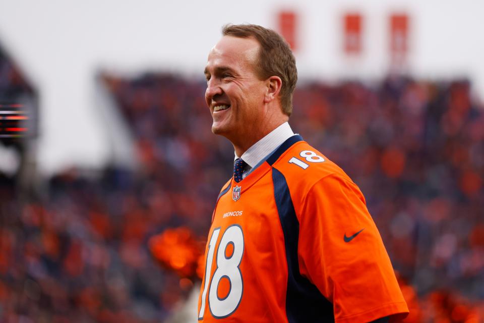 Peyton Manning looks on during a Ring of Honor induction ceremony at halftime of the game between the Washington Football Team and Denver Broncos at Empower Field At Mile High on Oct. 31, 2021 in Denver. (Photo by Justin Edmonds/Getty Images)