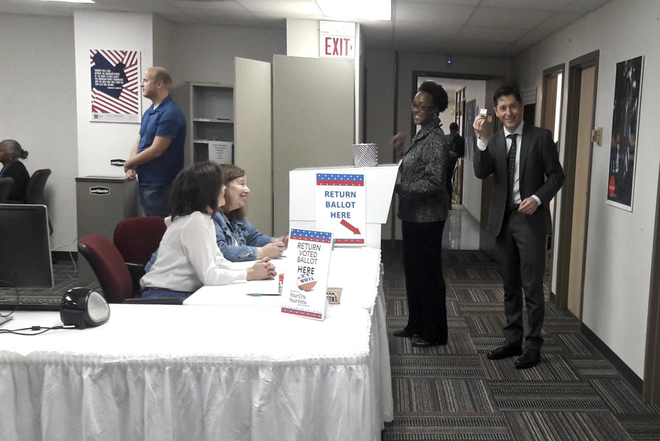 Minneapolis Mayor Jacob Frey shows off his "I Voted" sticker after casting his ballot on Friday, Sept. 21, 2018, on the first day of early voting in Minnesota in the 2018 midterm elections. Frey was the fourth person to take advantage of early voting Friday at the city's polling station in downtown Minneapolis. AP Photo/Steve Karnowski