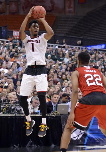 Anton Gill (1) shoots the ball over North Carolina State Wolfpack guard Ralston Turner (22). (USAT)