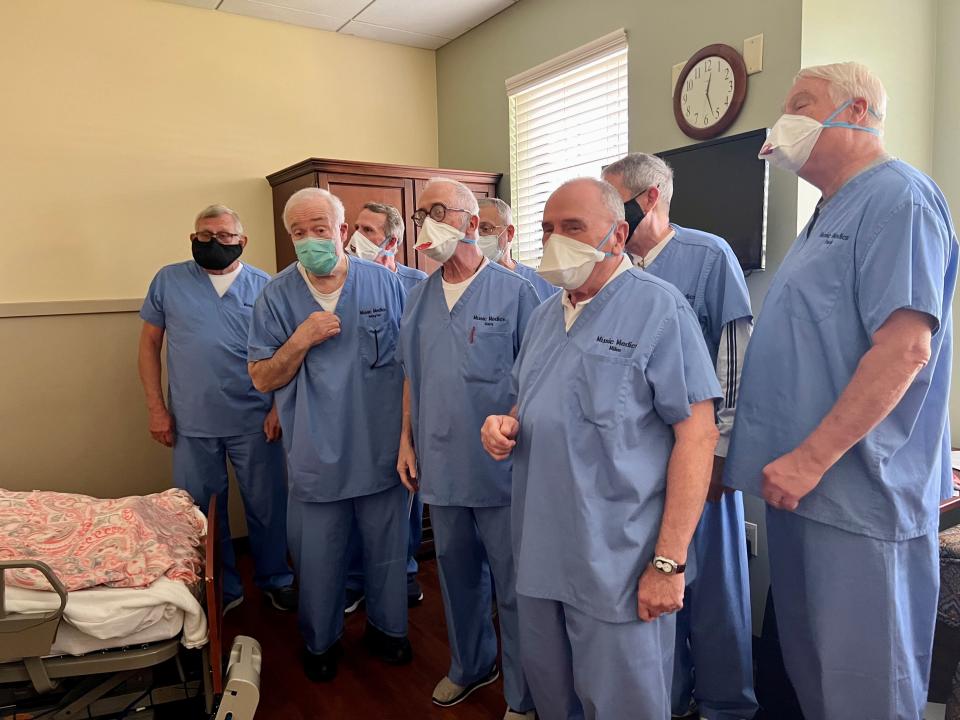 A cappella men's group Music City Medics serenade Alive Hospice patient Anita Corwin,  78, of Goodlettsville, Aug. 17, 2022, at Alive Hospice in Nashville