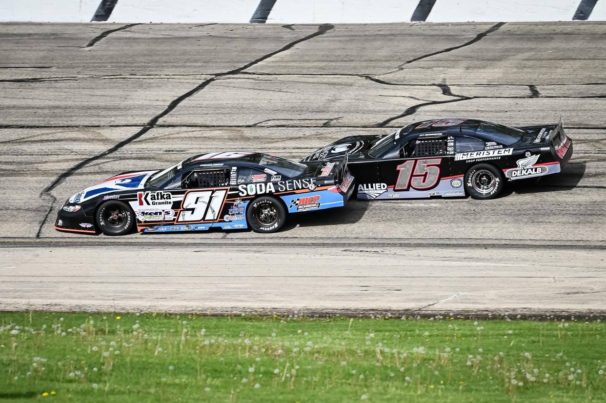 Ty Majeski (91) passes Gabe Sommers) for the lead in Turn 4 in the Joe Shear Classic 200 Sunday.