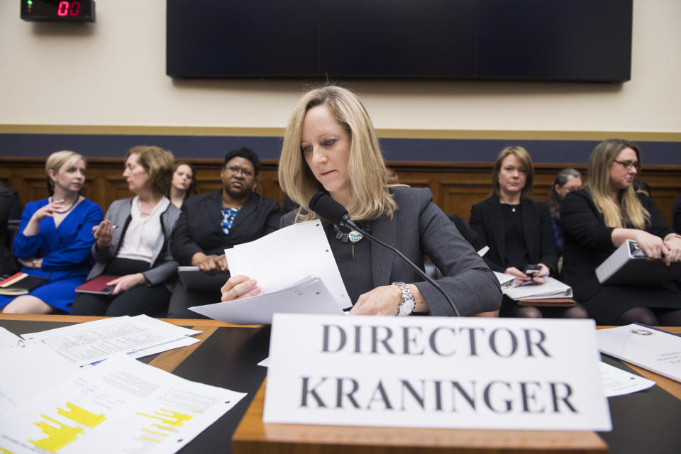 UNITED STATES - MARCH 7: Kathy Kraninger, director of the Consumer Financial Protection Bureau, prepares to testify at a House Financial Services Committee hearing titled "Putting Consumers First? A Semi-Annual Review of the Consumer Financial Protection Bureau," in Rayburn Building on Thursday, March 7, 2019. (Photo By Tom Williams/CQ Roll Call)