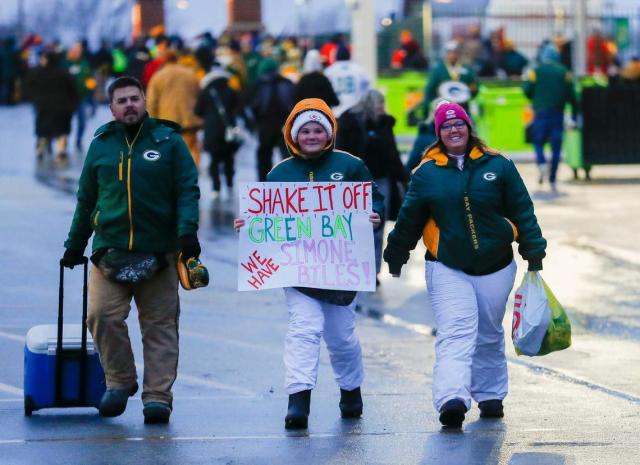 Kansas City Chiefs fan dons cheese-grater hat for Sunday Night Football  clash in Green Bay as Packers backers vie for Taylor Swift and Simone  Biles' attention with colorful signs