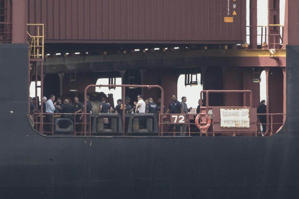 Officials gather on the decks of a container ship on the Delaware River in Philadelphia, Tuesday, June 18, 2019.U.S. authorities have seized more than $1 billion worth of cocaine from a ship at a Philadelphia port, calling it one of the largest drug busts in American history. The U.S. attorney’s office in Philadelphia announced the massive bust on Twitter on Tuesday afternoon. Officials said agents seized about 16.5 tons (15 metric tons) of cocaine from a large ship at the Packer Marine Terminal. (AP Photo/Matt Rourke)
