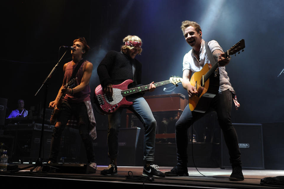 McFly performs on the Virgin Media stage during day one of the V Festival at Weston Park in Weston-under-Lizard.