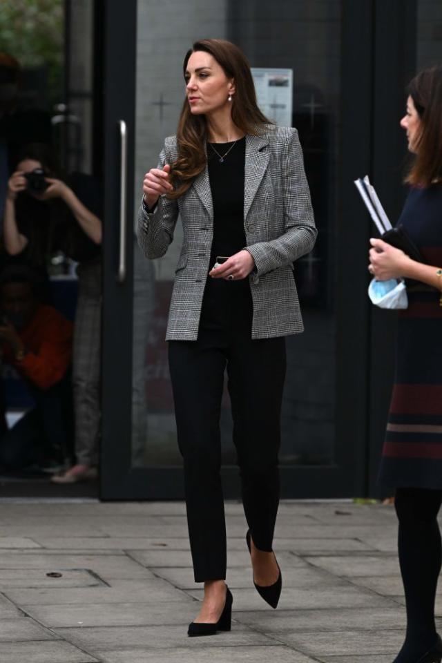 Kate nails workwear chic for PACT visit