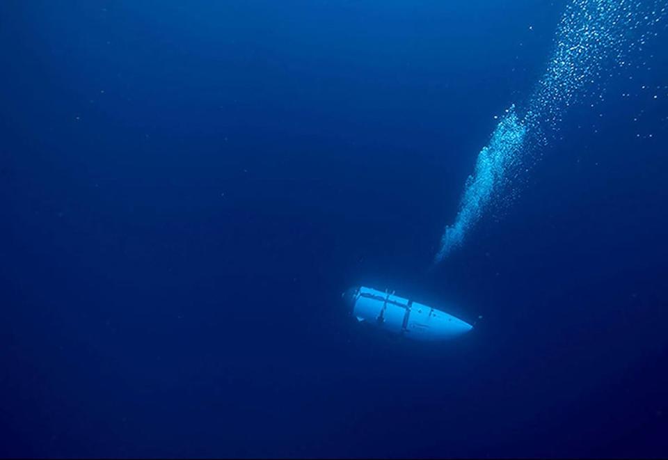 This undated image courtesy of OceanGate Expeditions, shows their Titan submersible during a descent (OceanGate Expeditions/AFP via Ge)