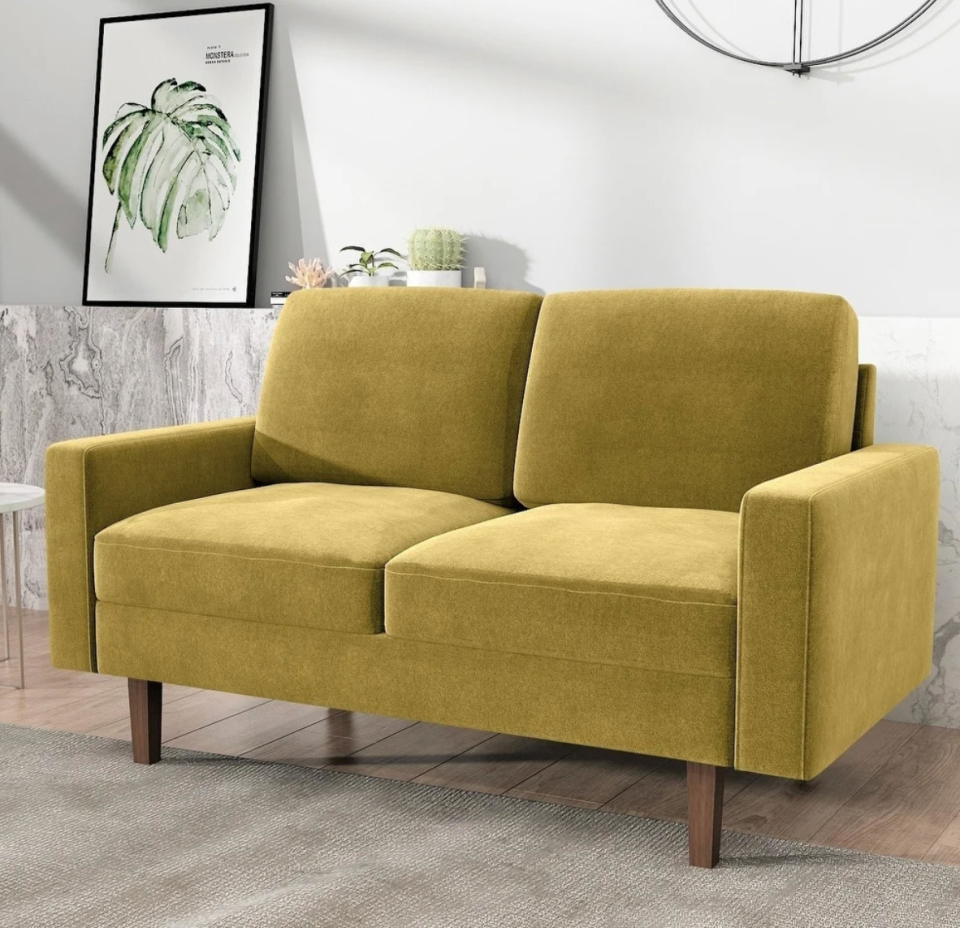 Carson Carrington Paajarvi Modern Velvet Loveseat in Golden Yellow (Photo via Overstock)