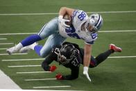 Dallas Cowboys tight end Dalton Schultz (86) catches a pass for a first down as Atlanta Falcons strong safety Damontae Kazee (27) makes the stop in the second half of an NFL football game in Arlington, Texas, Sunday, Sept. 20, 2020. (AP Photo/Ron Jenkins)