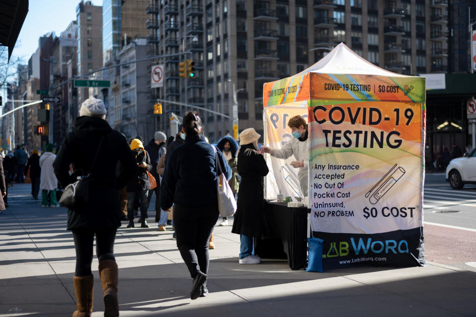 People wait in line at a COVID-19 testing location in New York City during Christmas week 