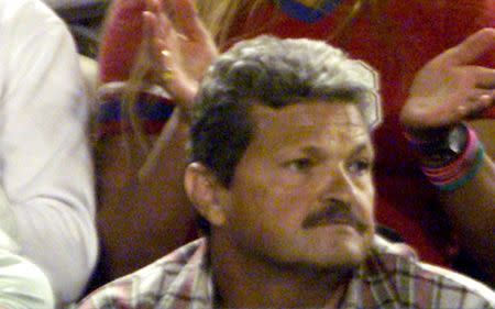 FILE PHOTO: Nick Philippoussis, father of Australian tennis star Mark Philippoussis is seen watcing his son play during a match at the Australian Open in Melbourne, Australia. REUTERS/Will Burgess/File Photo