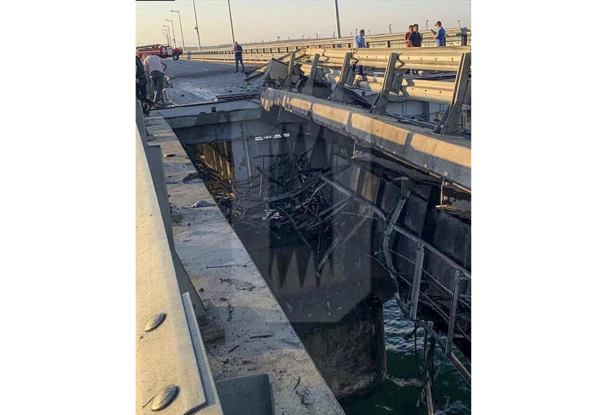 This photo reportedly shows damaged parts of an automobile link of the Crimean Bridge connecting Russian mainland and Crimean peninsula over the Kerch Strait not far from Kerch, Crimea. (Ostorozhno Novosti via AP)