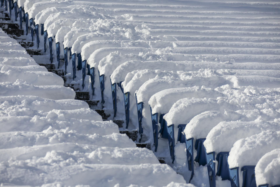 Stadium seats sit covered with snow before an NFL wild-card playoff football game between the Buffalo Bills and the Pittsburgh Steelers, Monday, Jan. 15, 2024, in Buffalo, N.Y. (AP Photo/Jeffrey T. Barnes)